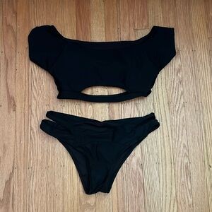 Size M woman's off the shoulder black swimsuit.